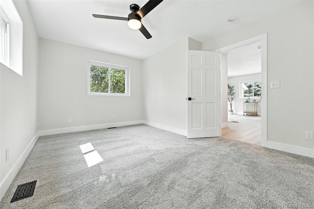 11635 W Security Ave, Lakewood, CO 80401 - unfurnished bedroom with carpet, multiple windows, and a ceiling fan