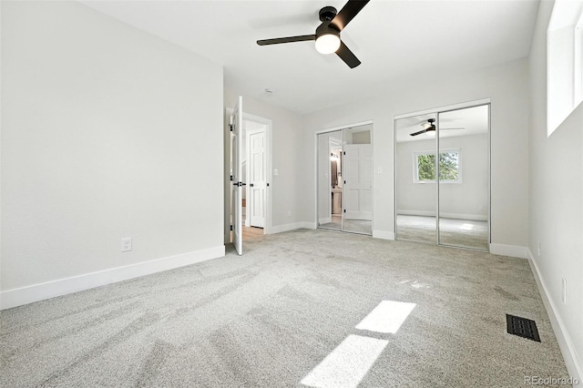 11635 W Security Ave, Lakewood, CO 80401 - unfurnished bedroom featuring carpet flooring, multiple closets, and ceiling fan