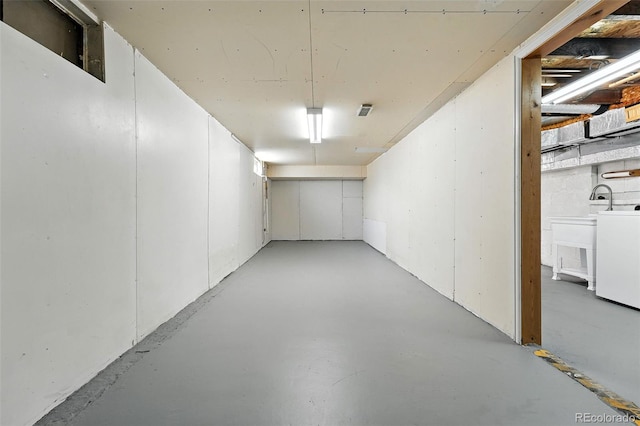 11635 W Security Ave, Lakewood, CO 80401 - unfinished basement featuring washer / clothes dryer and a sink