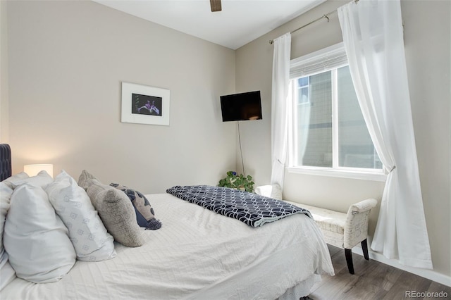 bedroom featuring ceiling fan and wood finished floors