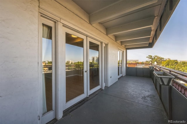 balcony featuring french doors