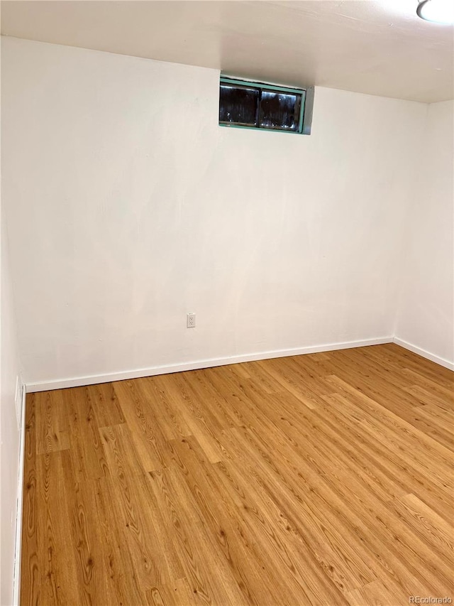 unfurnished room featuring light wood-type flooring