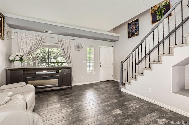 4955 Genoa St, Denver, CO 80249 - entrance foyer featuring stairway and wood finished floors