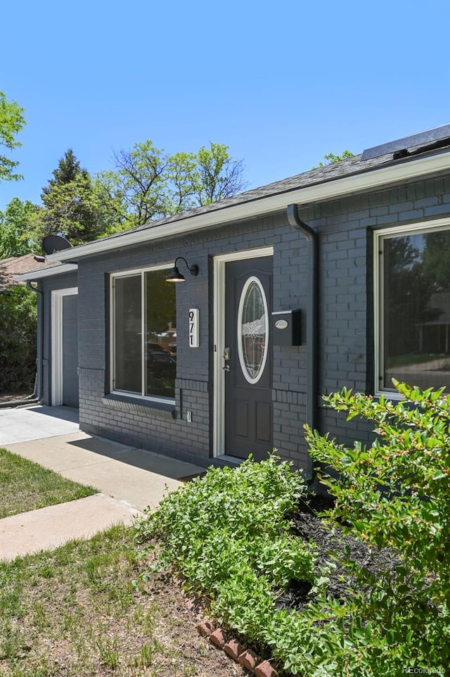 971 Ursula St, Aurora, CO 80011 - entrance to property featuring brick siding