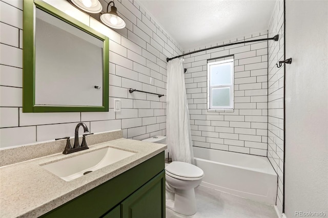 971 Ursula St, Aurora, CO 80011 - bathroom featuring toilet, vanity, shower / bath combo with shower curtain, and tile walls
