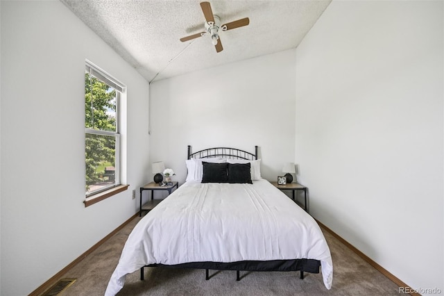 4220 Hunting Meadows Cir, Colorado Springs, CO 80916 - carpeted bedroom featuring a textured ceiling and a ceiling fan
