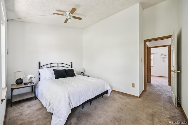 4220 Hunting Meadows Cir, Colorado Springs, CO 80916 - carpeted bedroom featuring a textured ceiling and ceiling fan