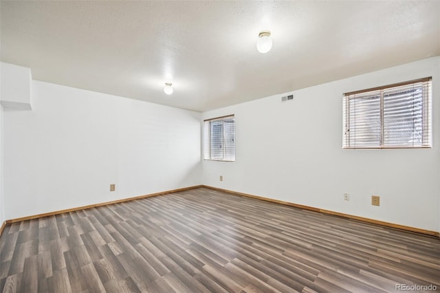 4220 Hunting Meadows Cir, Colorado Springs, CO 80916 - unfurnished room featuring wood finished floors and baseboards