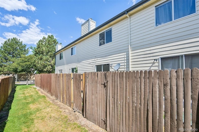 4220 Hunting Meadows Cir, Colorado Springs, CO 80916 - view of home's exterior with a chimney