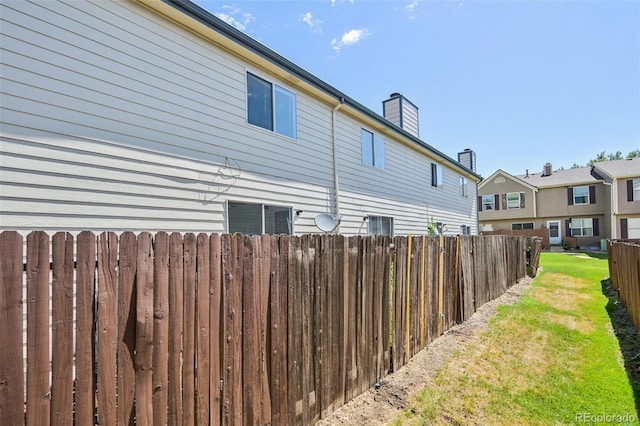 4220 Hunting Meadows Cir, Colorado Springs, CO 80916 - view of side of property with a chimney