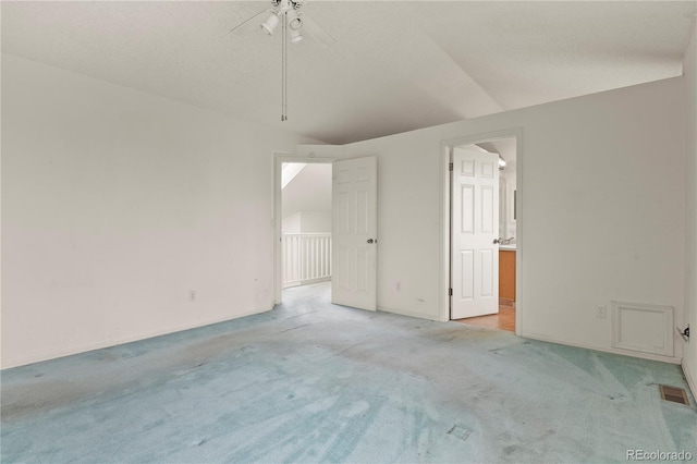 empty room featuring light carpet and visible vents