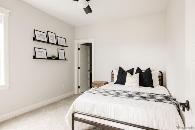 bedroom featuring carpet floors, baseboards, and ceiling fan
