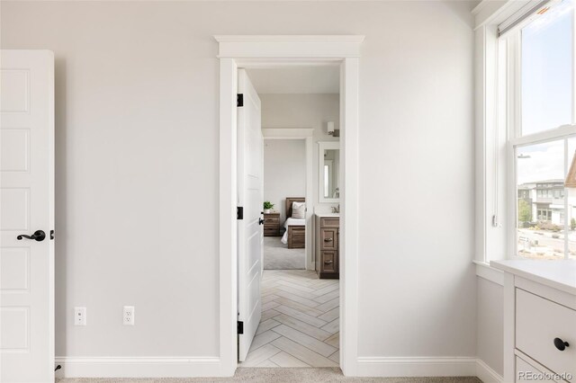 interior space with baseboards