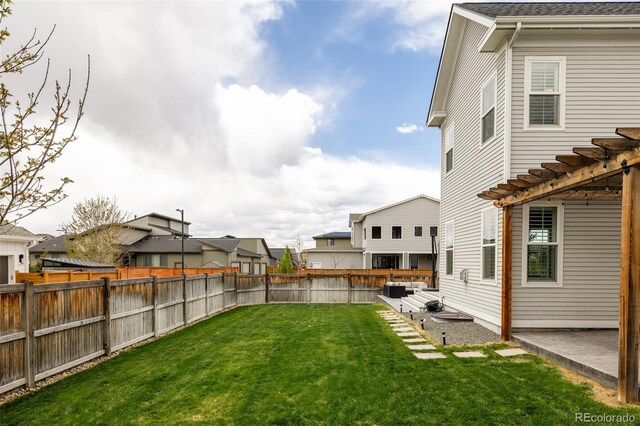 view of yard with a fenced backyard, a pergola, and a residential view