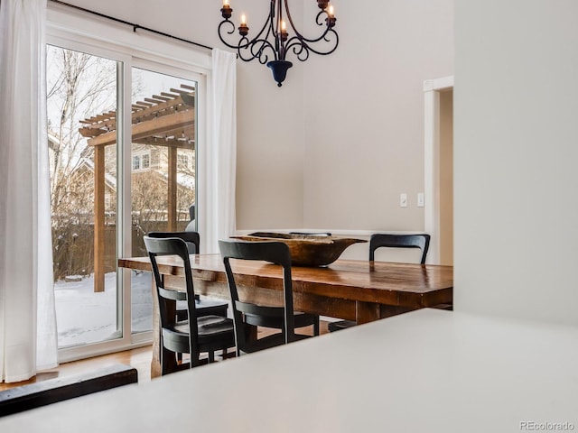 dining room with a notable chandelier