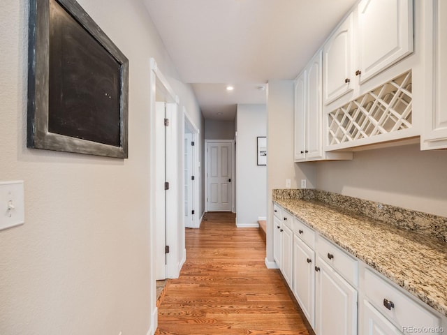 hallway featuring light hardwood / wood-style floors