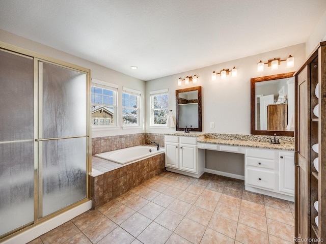 bathroom featuring vanity, tile patterned floors, and plus walk in shower