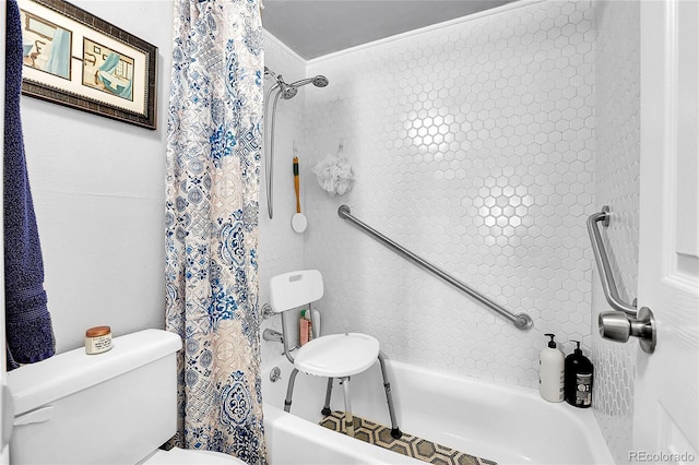 bathroom with shower / bath combo and toilet