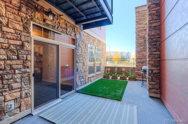 13456 Via Varra Unit 114, Broomfield, CO 80020 - view of patio / terrace
