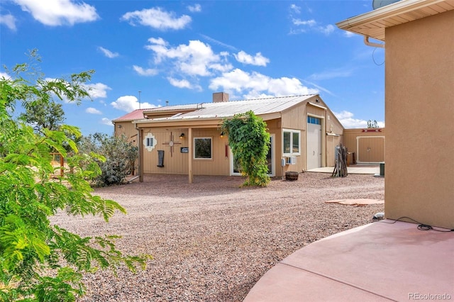 491 Newlin Ridge Rd, Florence, CO 81226 - back of house featuring a patio area and metal roof
