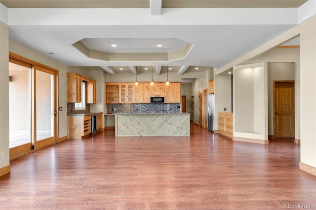 491 Newlin Ridge Rd, Florence, CO 81226 - kitchen with stainless steel appliances, wood finished floors, decorative backsplash, wine cooler, and recessed lighting