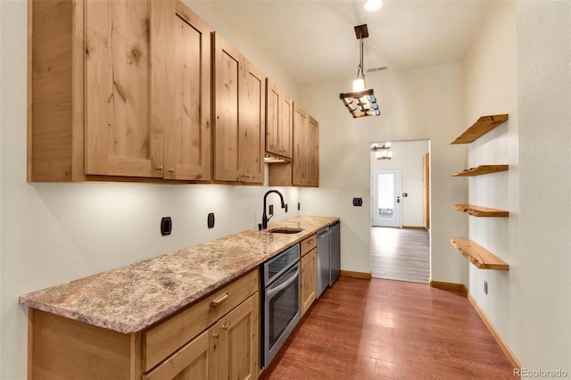 491 Newlin Ridge Rd, Florence, CO 81226 - kitchen with appliances with stainless steel finishes, a sink, open shelves, wood finished floors, and baseboards