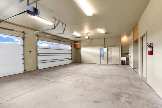 491 Newlin Ridge Rd, Florence, CO 81226 - garage featuring a garage door opener and a sink