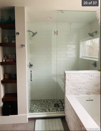 4428 Perry St, Denver, CO 80212 - bathroom with a stall shower, a garden tub, and tile patterned floors