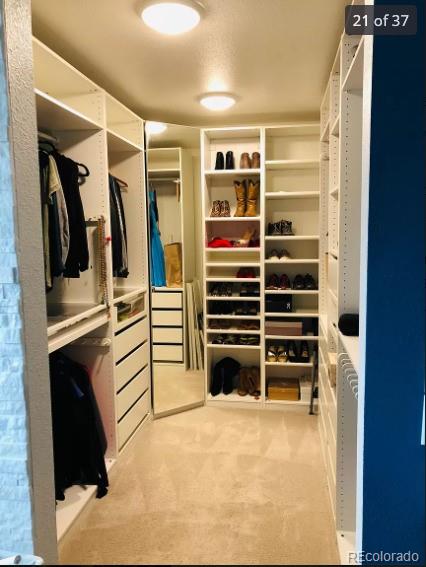 4428 Perry St, Denver, CO 80212 - spacious closet featuring carpet floors