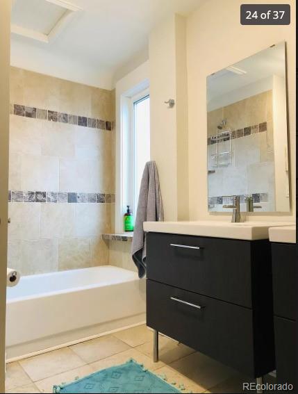 4428 Perry St, Denver, CO 80212 - full bathroom featuring vanity, a bath, and tile patterned flooring