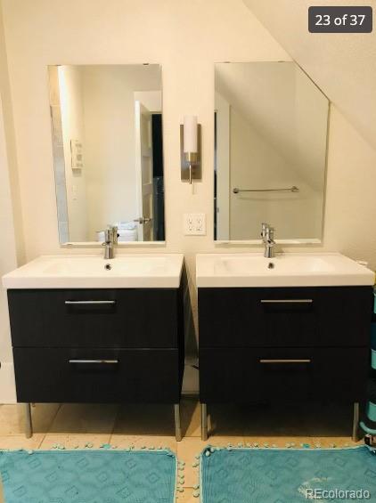 4428 Perry St, Denver, CO 80212 - bathroom featuring two vanities