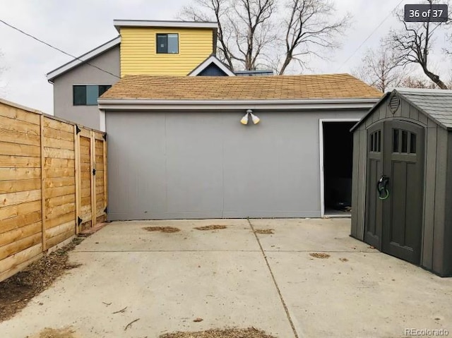 4428 Perry St, Denver, CO 80212 - garage featuring a storage shed