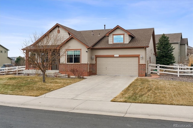 craftsman-style home with fence, a shingled roof, concrete driveway, a garage, and brick siding