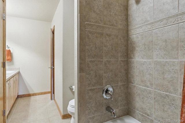 bathroom featuring vanity, baseboards, shower / tub combination, toilet, and tile patterned floors