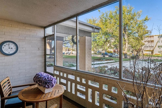 sunroom featuring a healthy amount of sunlight