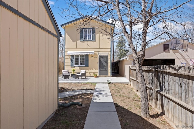 1343 Valentia St, Denver, CO 80220 - back of house with a patio