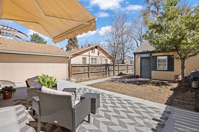 1343 Valentia St, Denver, CO 80220 - view of patio featuring an outbuilding