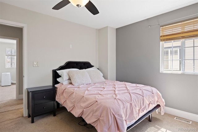 1343 Valentia St, Denver, CO 80220 - bedroom featuring carpet flooring, a ceiling fan, and baseboards
