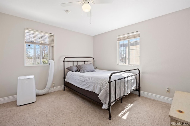 1343 Valentia St, Denver, CO 80220 - carpeted bedroom with baseboards and a ceiling fan