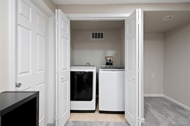 1343 Valentia St, Denver, CO 80220 - laundry area with washing machine and dryer and baseboards