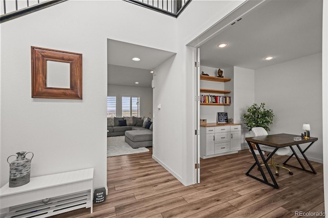 14102 Night Owl Ln, Parker, CO 80134 - office area featuring wood finished floors, recessed lighting, and baseboards