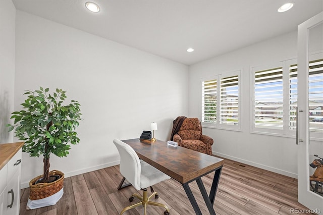 14102 Night Owl Ln, Parker, CO 80134 - office space featuring light wood-style flooring, baseboards, and recessed lighting