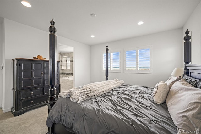 14102 Night Owl Ln, Parker, CO 80134 - bedroom with light carpet, recessed lighting, and ensuite bath