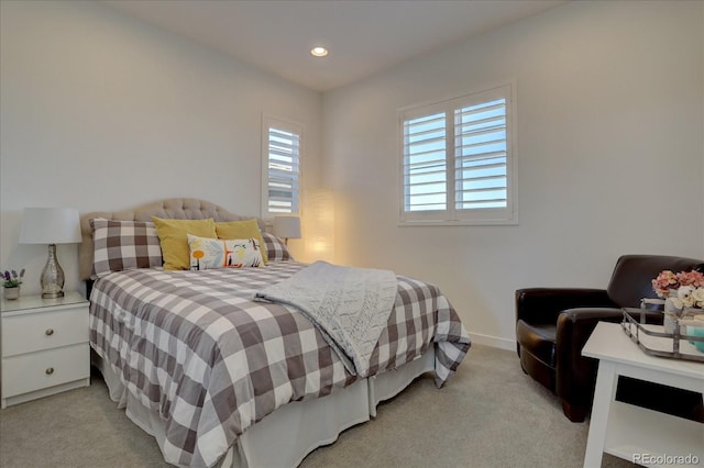 14102 Night Owl Ln, Parker, CO 80134 - bedroom with light carpet, recessed lighting, and baseboards
