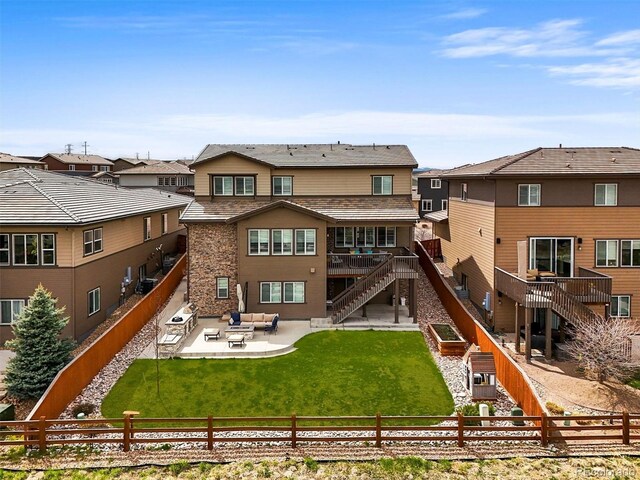 14102 Night Owl Ln, Parker, CO 80134 - back of property featuring an outdoor hangout area, a patio, stairs, and a residential view