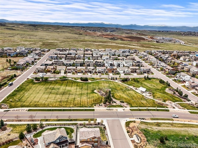 14102 Night Owl Ln, Parker, CO 80134 - aerial overview of property's location featuring nearby suburban area and a mountainous background