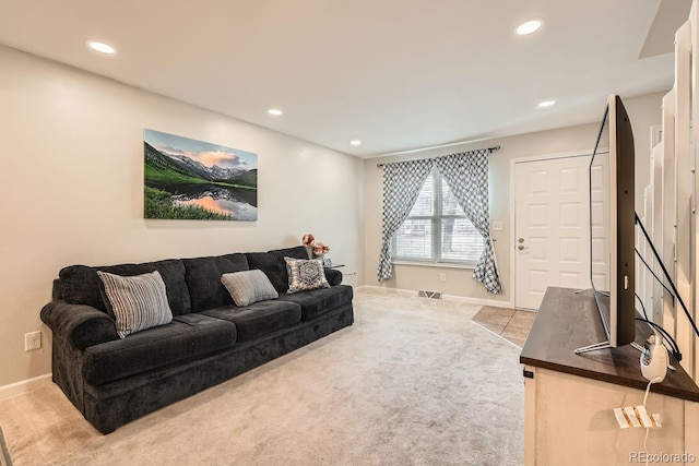 living room featuring light colored carpet