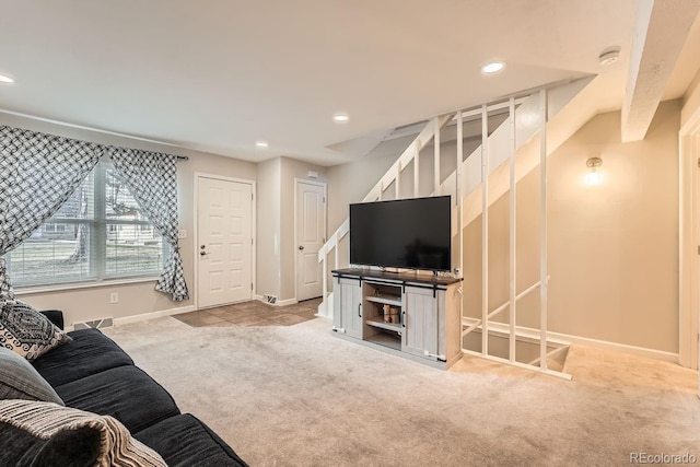 living room featuring light carpet