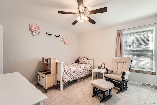 carpeted bedroom featuring ceiling fan