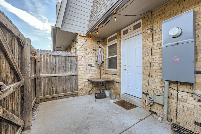 property entrance with a patio